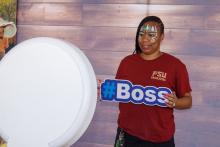 woman taking a photo in photobooth