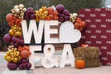 Light up marquee letters that spell out "We heart F&amp;A"